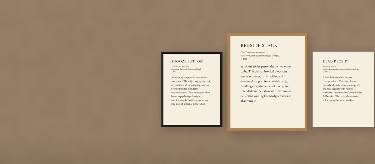 Three Bedtime collection prints framed in black, oak, and white on a bedroom wall at dusk